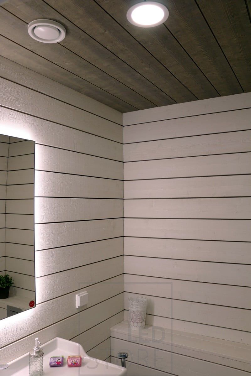 Ceiling lighting with LED ceiling tiles and an LED spotlight as an atmospheric indirect light. Ledstore.fi